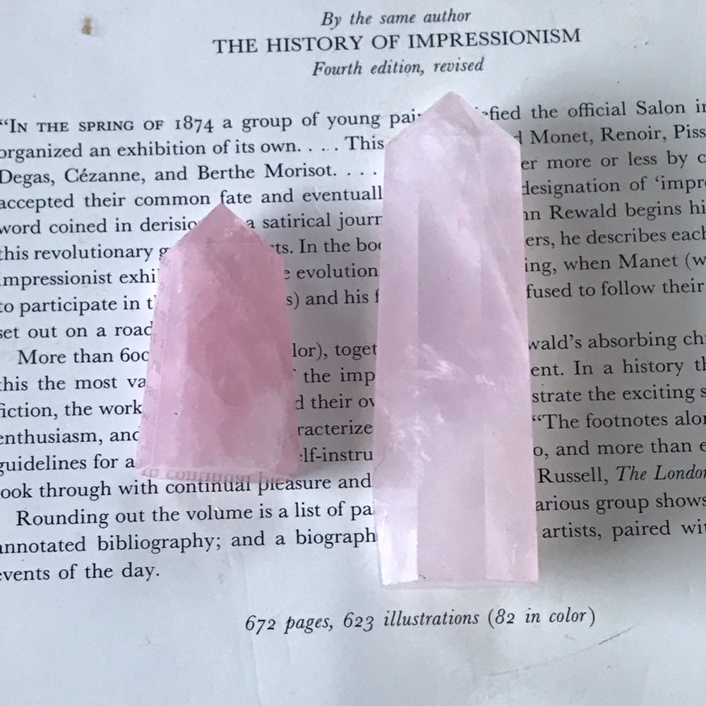 Two small rose quartz wand points
